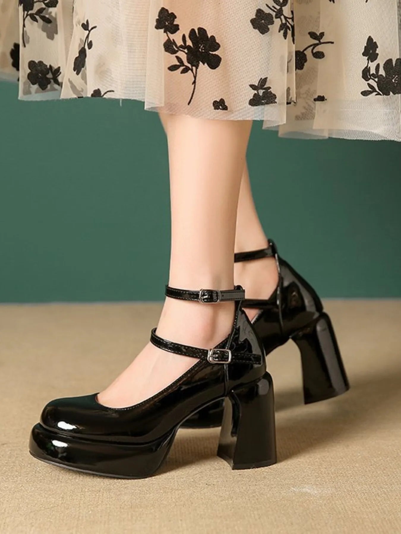 Patent Leather Mary Jane Platform Pumps.