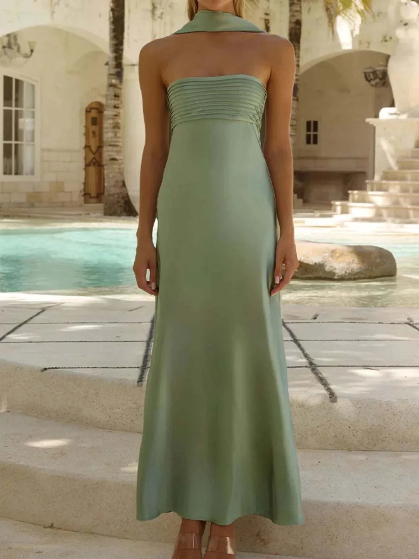 Tube mermaid maxi dress in soft green polyester with strapless design and slim fit.