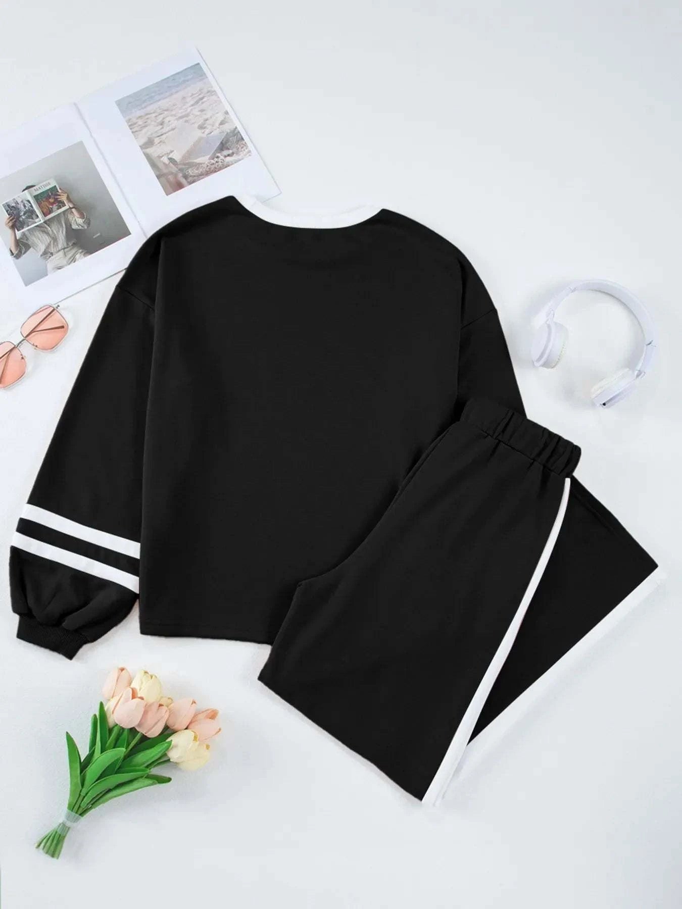 Black two-piece Contrast Trim Round Neck Top and Pants Set with white drawstring trim and slightly stretchy fabric