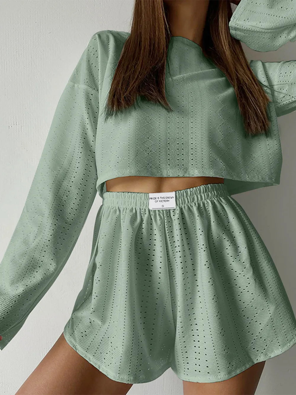 Light green eyelet round neck top and shorts set with long sleeves and elastic waist shorts