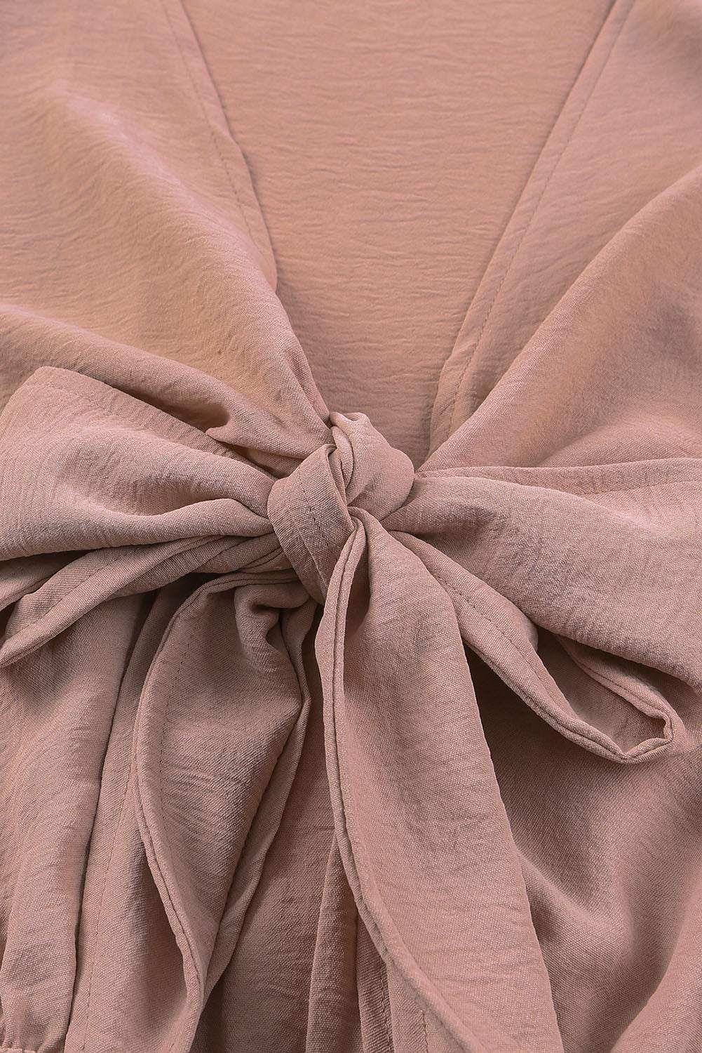 Tied Flounce Sleeve Plunge RomperPattern type: Solid
Style: Sexy
Features: Tie, Pockets
Neckline: Plunge
Length: Short
Sleeve length: Long sleeves
Sleeve type: Lantern sleeves
Material composition: Redemption By Ashley NorthTied Flounce Sleeve