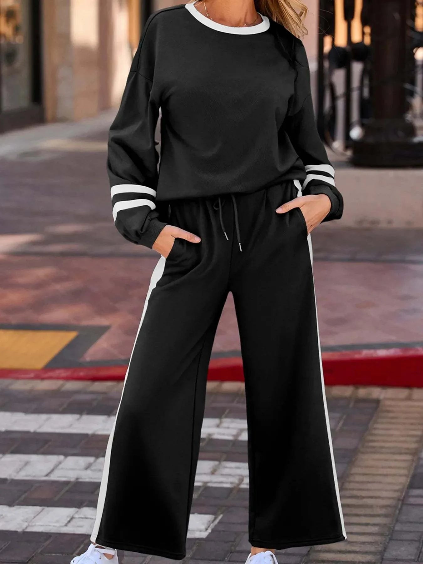 Black contrast trim round neck top and pants set with drawstring and white stripes on sleeves and sides